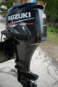купить 4х-тактный лодочный мотор SUZUKI DF60ATL Б/У в Москве - фото 