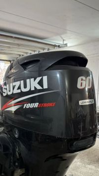 купить 4х-тактный лодочный мотор SUZUKI DF60ATL Б/У в Москве - фото 
