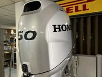 купить 4х-тактный лодочный мотор HONDA BF50 LRTU Б/У в Москве - фото 