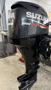 купить 4х-тактный лодочный мотор SUZUKI DF60ATL Б/У в Москве - фото 