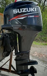 купить 4х-тактный лодочный мотор SUZUKI DF60ATL Б/У в Москве - фото 